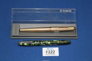 A 9ct gold Parker cartridge pen and a Conway Stewart 75 fountain pen with 14ct gold nib.