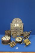 A box of clock parts including; brass face for 8 day long case clock, etc.