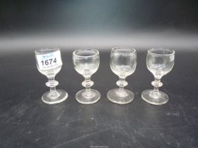 A set of four Georgian Gin/liquor glasses, pontil marks to base.
