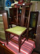 A darkwood framed arts and crafts side Chair having turned legs and backrest supports to the five