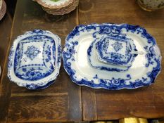 A quantity of Antique Flow Blue dinnerware to include a large meat plate (50 cm x 32 cm),