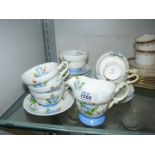 A Royal Paragon "Primrose" part tea set including five cups, six saucers, and tea plates milk jug,