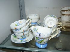 A Royal Paragon "Primrose" part tea set including five cups, six saucers, and tea plates milk jug,
