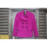 A ladies size 8 double breasted Precis jacket with funnel collar in cerise,