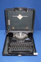 A cased Corona typewriter.