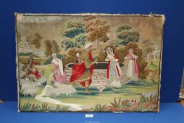 A Crewel work on silk embroidery of a Middle Eastern landscape with people and animals gathering