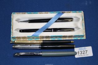 Five pens including Platinum ballpoint and pencil set, Papermate ballpoint,