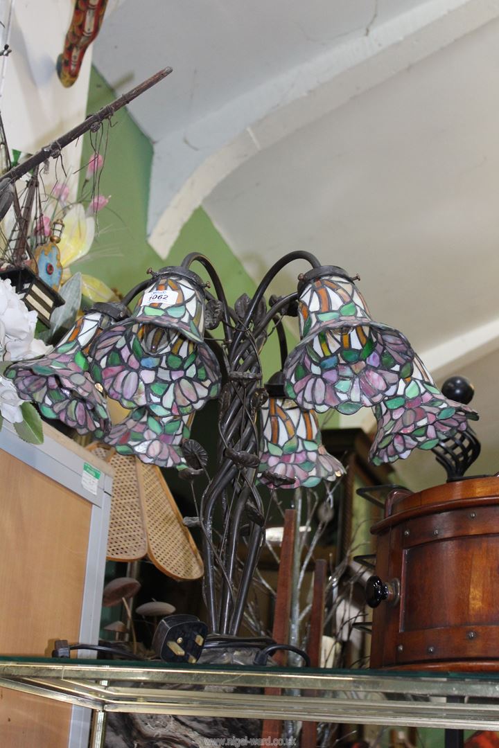 A six branch floral Tiffany style Lamp with entwined leaf base, 18 3/4'' tall. - Image 4 of 4