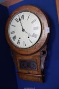 A Wall Clock in a carved and inlaid case with pendulum, key and winder, 27'' high, some damage.