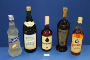 Five bottles of alcohol including White Horse Whisky, Metaxa, Spanish Brandy, Melon Vodka, etc.