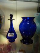 A signed Bristol Blue Glass perfume bottle with long intact wand, 7 1/2" tall,