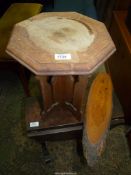 An Arts and Crafts fret-worked legged octagonal Occasional Table,