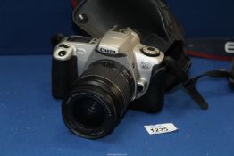A Canon EOS 300 camera with case, 28-80mm, f3.5-5.6 lens.