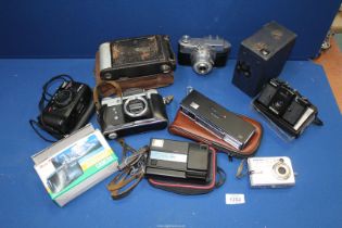 A quantity of cameras including Koroll 245, Zenit-E, Kodak, Zenith LCA Lomo film camera, etc.