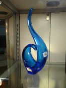 A Murano style Glass sculpture in merging shades of blue, 14 3/4" tall.