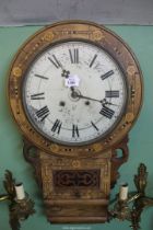 An inlaid Walnut and other woods Wall Clock having a two train spring driven movement (running at