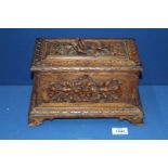 An ornate Tea caddy with applied floral decoration, 11 1/4" x 7" x 7" high.