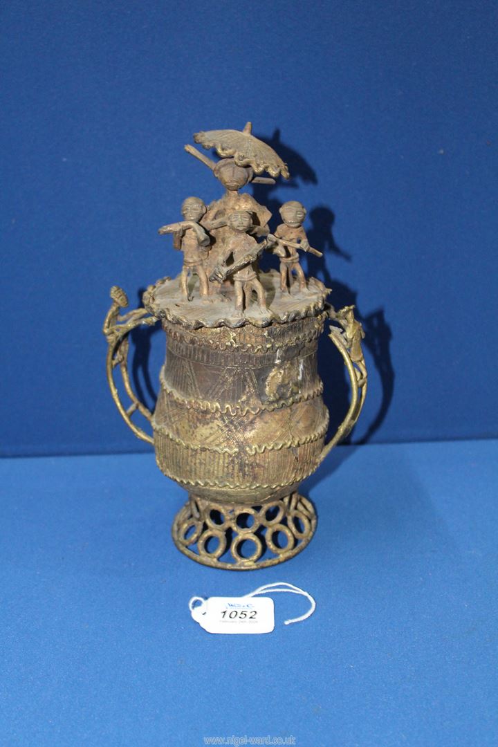 An early to mid 20th century Ashanti/Akan gold dust lidded bronze Urn highly decorated with incised