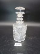 A 19th century mallet shaped cut glass decanter, 7½" tall, some chips.