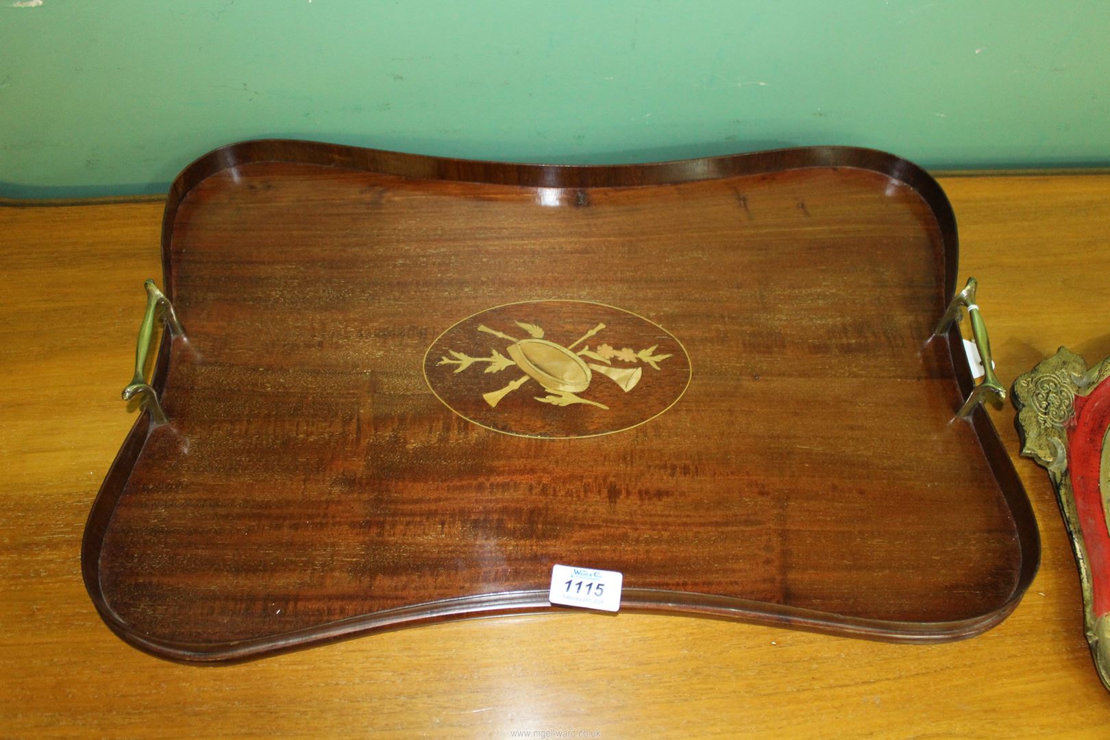 A 19th c Mahogany butlers tray central Satinwood inlay in rectangular serpentine shape and brass