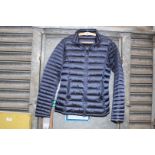 A ladies size 10 quilted Barbour jacket in metallic navy.