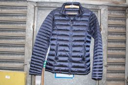 A ladies size 10 quilted Barbour jacket in metallic navy.