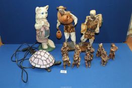 A quantity of miscellaneous figures including; musicians, tribal water carrier,
