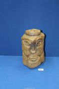 A heavy modernist carved stone head, 10 3/4" high.