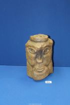 A heavy modernist carved stone head, 10 3/4" high.