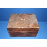 A Walnut vanity/writing Box with blue velvet lined interior, two perfume bottles (one badly a/f),