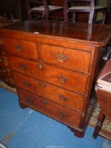 A fine quality Mahogany and Walnut Chest of three long and two short drawers having lightwood