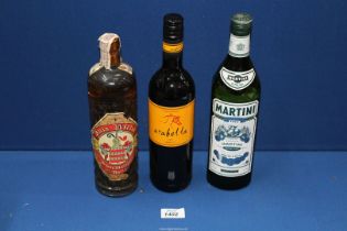 Three bottles of alcohol; Martini Extra Dry, Arabella Merlot and Anis Nectar.