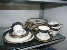 A quantity of Royal Doulton 'Carlyle' dinner and teaware including cups, saucers, dinner,