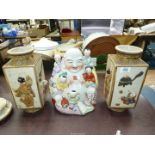 A pair of Oriental square vases, and a laughing Buddha with Children.