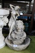 A composite Water feature with nymph and lion head detail, 19 1/2" tall.