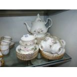 A quantity of Royal Kent 'Sylvia' tea ware including five cups, seven saucers, teapot, sugar bowl,