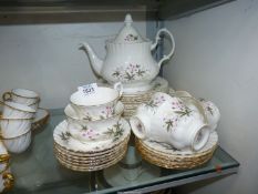 A quantity of Royal Kent 'Sylvia' tea ware including five cups, seven saucers, teapot, sugar bowl,