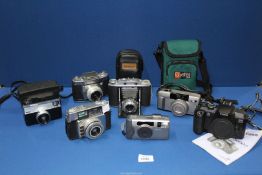 A box of film cameras to include; Canon 5000, Nikon Zoom 400, Canon Z135, Kodak Instamatic 233,
