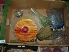 A quantity of coloured glass including vivid orange and red streaked bowl,