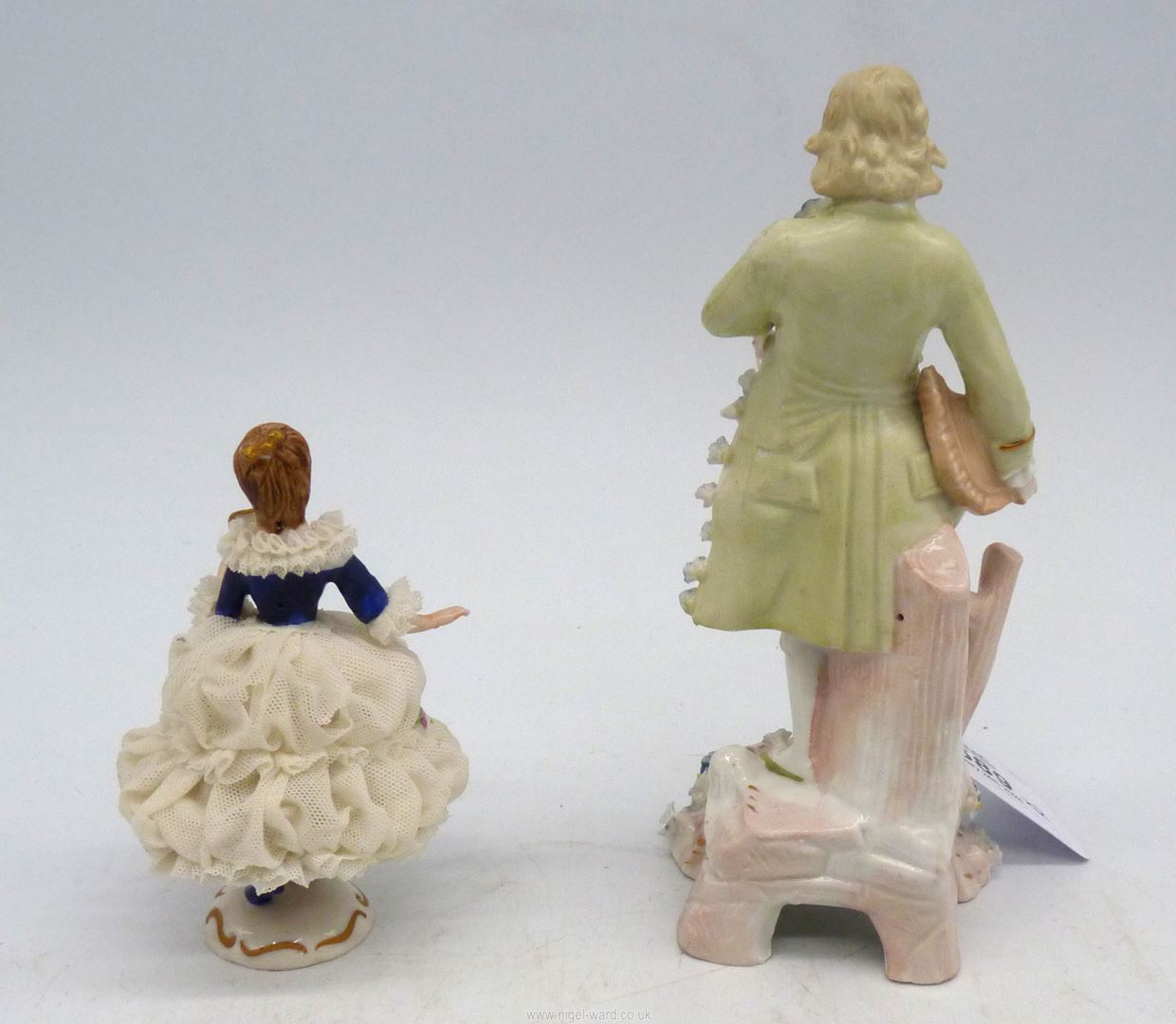 A figure of a man in a period floral encrusted costume and a small Bavarian made figure of a lady - Image 2 of 3