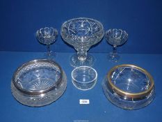 A quantity of clear glass including; trifle bowl having metal rim, table centrepiece,