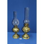 Two brass Oil lamps, 21 1/4'' x 19'' tall including glass chimneys.