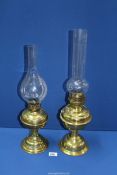 Two brass Oil lamps, 21 1/4'' x 19'' tall including glass chimneys.
