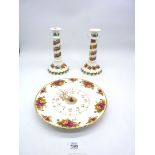 A pair of Portmeirion Pomana candlesticks,