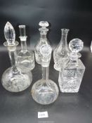Five decanters including Galway cut glass engraved decanter and a cut glass carafe etc.