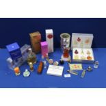 Assorted vintage perfume bottles including; Ralph Lauren, Christian Dior, 'Organza' Givenchy, etc.