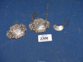 Three Silver decanter Labels including; a pair for Sherry and Port,