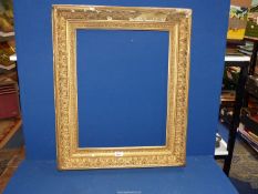 A gilt picture frame, aperture size 17" x 22 1/4", overall size 24 3/4" x 30", some losses.