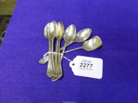 A set of six silver teaspoons and a sugar shovel, Sheffield 1915 and Birmingham 1949, 100g.