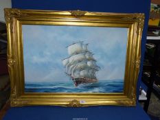 A large framed oil on canvas depicting a Galleon ship on high seas,